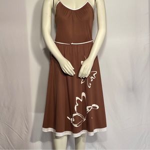 Vintage Shaheen spaghetti strapped dress. It is brown with white butterflies.